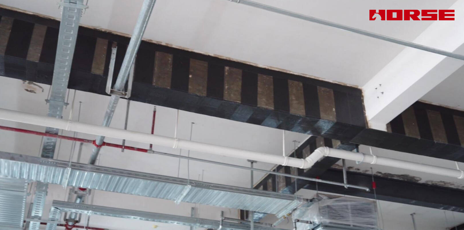 Structural Retrofit with Carbon Fiber after Floor Slab Demolition Structural Retrofit with Carbon Fiber after Floor Slab Demolition