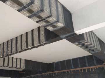 Structural beams strengthening on 7th floor by carbon plate and carbon wrap